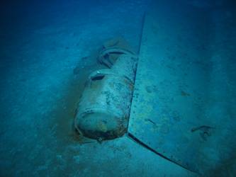 Steel plate and cylindrical tank on seabed. Top of B turret?